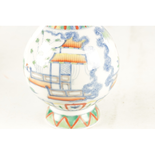 232 - A LATE CHINESE POLYCHROME BULBOUS VASE WITH TAPERED NECK AND SWOLLEN TOP decorated all-round with pa... 