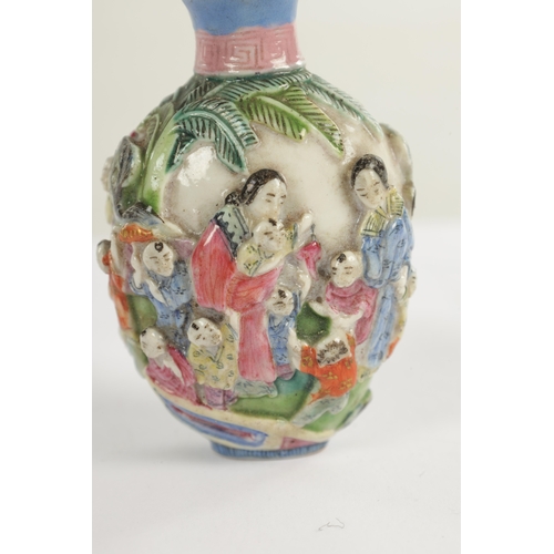 235 - A 19TH CENTURY CHINESE OVOID SNUFF BOTTLE decorated relief raised figures with signed character mark... 