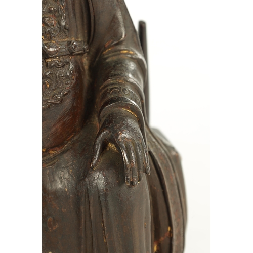 236 - A RARE AND LARGE 17TH CENTURY MING DYNASTY CHINESE POLYCHROME BRONZE IMMORTAL modelled in a seated p... 