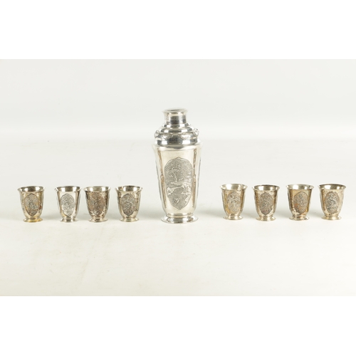 243 - AN EARLY 20TH CENTURY CHINESE SILVER METAL COCKTAIL SHAKER AND EIGHT SHOT GLASSES having panelled fi... 