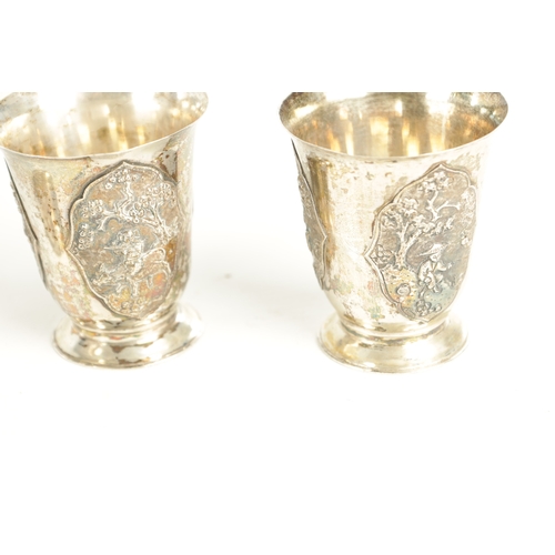 243 - AN EARLY 20TH CENTURY CHINESE SILVER METAL COCKTAIL SHAKER AND EIGHT SHOT GLASSES having panelled fi... 