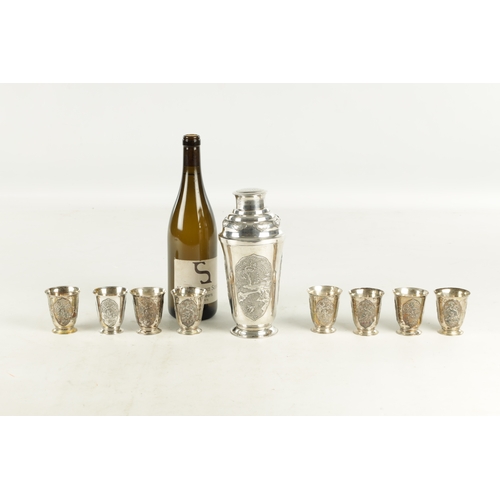 243 - AN EARLY 20TH CENTURY CHINESE SILVER METAL COCKTAIL SHAKER AND EIGHT SHOT GLASSES having panelled fi... 