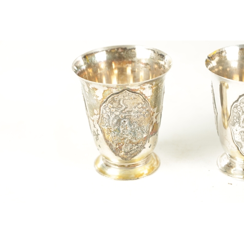 243 - AN EARLY 20TH CENTURY CHINESE SILVER METAL COCKTAIL SHAKER AND EIGHT SHOT GLASSES having panelled fi... 