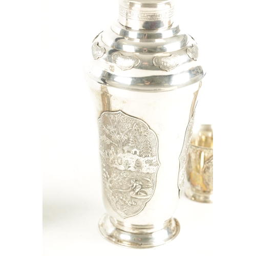 243 - AN EARLY 20TH CENTURY CHINESE SILVER METAL COCKTAIL SHAKER AND EIGHT SHOT GLASSES having panelled fi... 