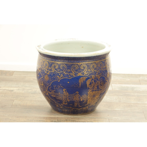 247 - A 19TH CENTURY CHINESE JARDINIERE OF LARGE SIZE on blue ground with panelled gilt decoration. (40cm ... 