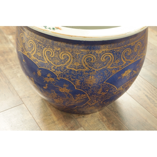 247 - A 19TH CENTURY CHINESE JARDINIERE OF LARGE SIZE on blue ground with panelled gilt decoration. (40cm ... 