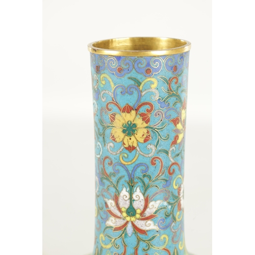 257 - AN 18TH CENTURY CHINESE CLOISONNÉ BELL SHAPED VASE with brightly coloured floral enamels. (32cm high... 