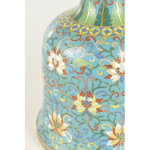 257 - AN 18TH CENTURY CHINESE CLOISONNÉ BELL SHAPED VASE with brightly coloured floral enamels. (32cm high... 