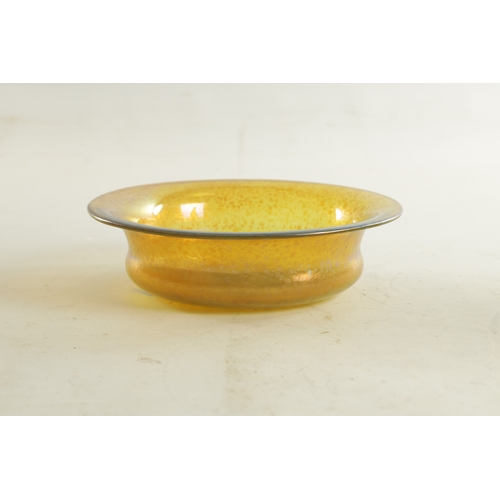 26 - AN ART NOUVEAU LOETZ PAPILLON YELLOWISH-GREEN IRIDESCENT SHALLOW GLASS BOWL the ogee body with inver... 