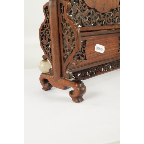 260 - A 19TH CENTURY CHINESE HARDWOOD AND CARVED JADE TABLE SCREEN with finely fret-cut surround having ca... 