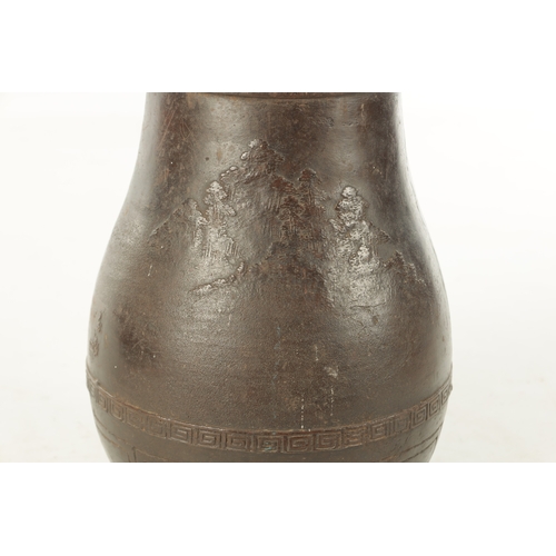 264 - A JAPANESE MEIJI PERIOD CAST IRON PATINATED VASE with relief moulded country scene with pagodas - si... 