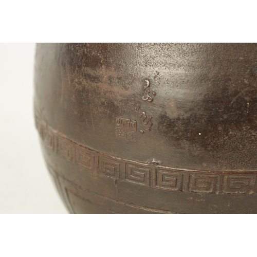 264 - A JAPANESE MEIJI PERIOD CAST IRON PATINATED VASE with relief moulded country scene with pagodas - si... 