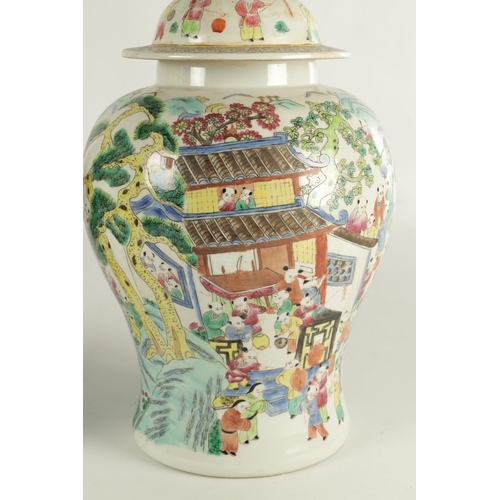 267 - A PAIR OF CHINESE REPUBLIC PORCELAIN VASES AND COVERS decorated wit brightly coloured figural scenes... 