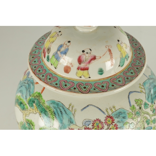 267 - A PAIR OF CHINESE REPUBLIC PORCELAIN VASES AND COVERS decorated wit brightly coloured figural scenes... 