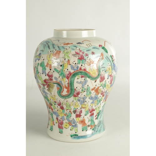 267 - A PAIR OF CHINESE REPUBLIC PORCELAIN VASES AND COVERS decorated wit brightly coloured figural scenes... 