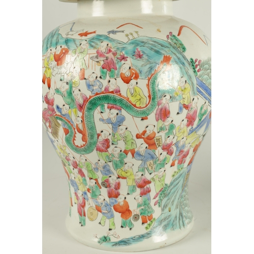 267 - A PAIR OF CHINESE REPUBLIC PORCELAIN VASES AND COVERS decorated wit brightly coloured figural scenes... 