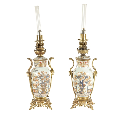 269 - A PAIR OF LATE 19TH CENTURY JAPANESE MEIJI IMARI AND GILT VASE LAMPS OF AESTHETIC DESIGN with bloomi... 