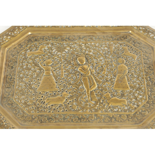 270 - A 19TH CENTURY INDIAN ENGRAVED BRASS TWO-HANDLED TRAY with a peacock centre and a similar pierced br... 