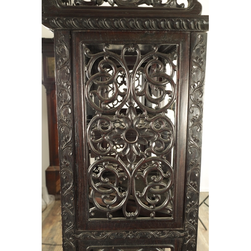 271 - A GOOD 19TH CENTURY CHINESE CARVED HARDWOOD DISPLAY CABINET with pierced and leaf-carved decoration ... 