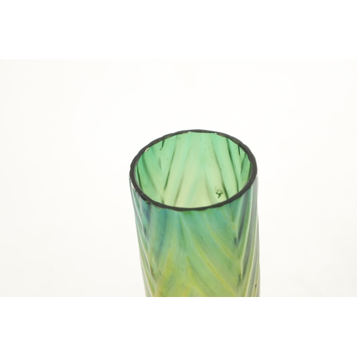 28 - AN ART NOUVEAU LOETZ TYPE IRIDESCENT GLASS VASE the stylish swirled base moulded body, with slender ... 