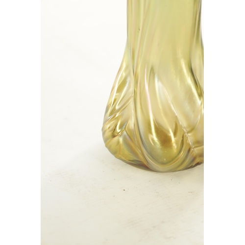 28 - AN ART NOUVEAU LOETZ TYPE IRIDESCENT GLASS VASE the stylish swirled base moulded body, with slender ... 