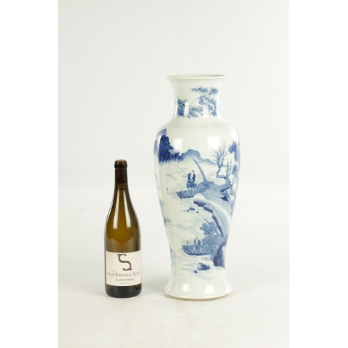 281 - A 19TH CENTURY CHINESE BLUE AND WHITE VASE OF 17TH CENTURY KANGXI DESIGN the slender tapering should... 