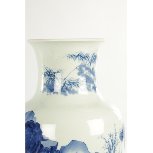 281 - A 19TH CENTURY CHINESE BLUE AND WHITE VASE OF 17TH CENTURY KANGXI DESIGN the slender tapering should... 