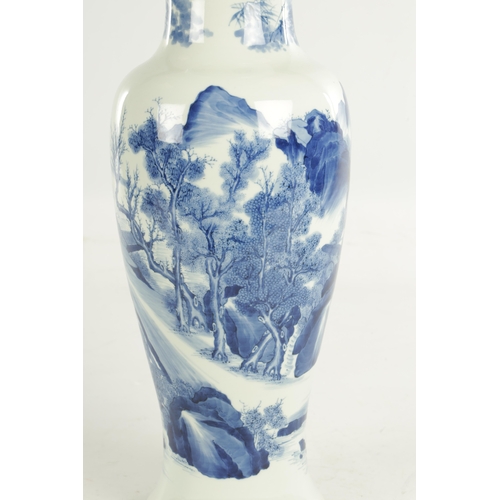 281 - A 19TH CENTURY CHINESE BLUE AND WHITE VASE OF 17TH CENTURY KANGXI DESIGN the slender tapering should... 