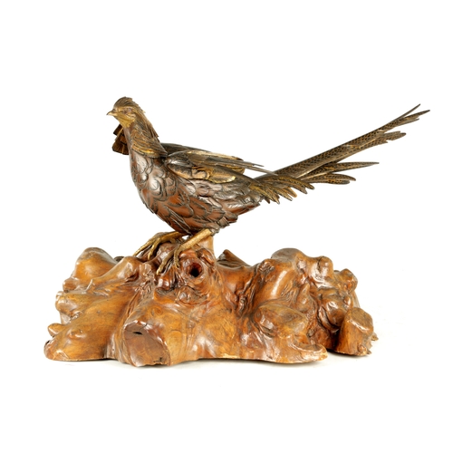 282 - A LATE 19TH CENTURY JAPANESE MEIJI PERIOD GILT AND POLYCHROME BRONZE OKIMONO / PHEASANT SCULPTURE BE... 