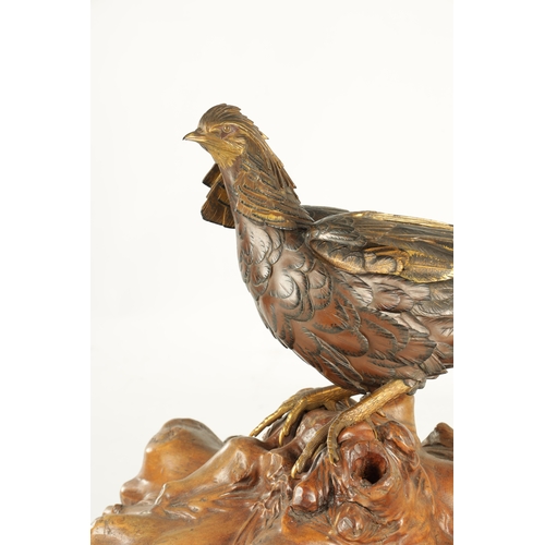 282 - A LATE 19TH CENTURY JAPANESE MEIJI PERIOD GILT AND POLYCHROME BRONZE OKIMONO / PHEASANT SCULPTURE BE... 