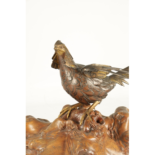 282 - A LATE 19TH CENTURY JAPANESE MEIJI PERIOD GILT AND POLYCHROME BRONZE OKIMONO / PHEASANT SCULPTURE BE... 