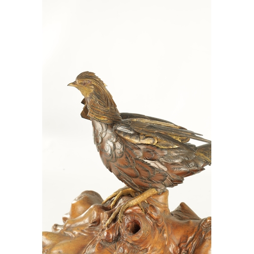 282 - A LATE 19TH CENTURY JAPANESE MEIJI PERIOD GILT AND POLYCHROME BRONZE OKIMONO / PHEASANT SCULPTURE BE... 