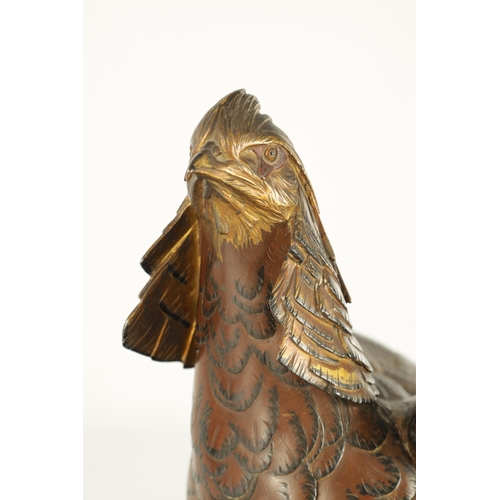 282 - A LATE 19TH CENTURY JAPANESE MEIJI PERIOD GILT AND POLYCHROME BRONZE OKIMONO / PHEASANT SCULPTURE BE... 