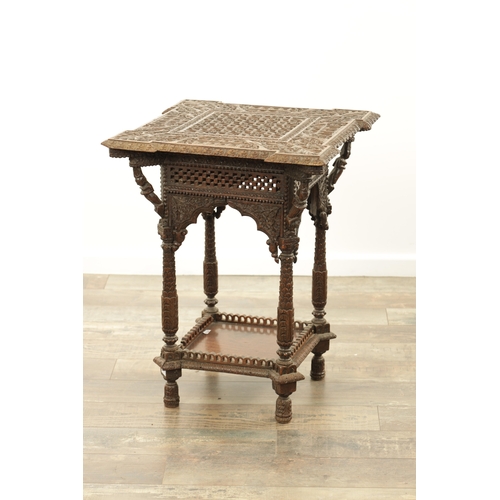 284 - A 19TH CENTURY INDIAN PROFUSELY CARVED HARDWOOD CENTRE TABLE the top with geometric flower head pane... 