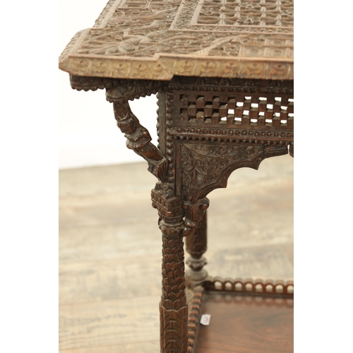 284 - A 19TH CENTURY INDIAN PROFUSELY CARVED HARDWOOD CENTRE TABLE the top with geometric flower head pane... 