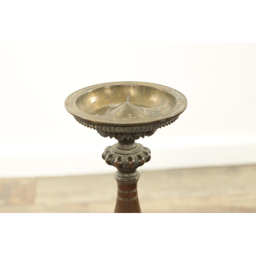 288 - A COLLECTION OF 17TH TO 19TH CENTURY EASTERN METALWARE comprising of a large dome based bronze candl... 