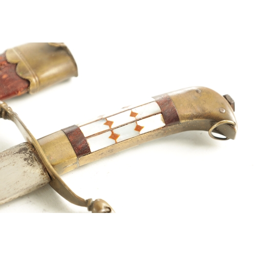 289 - AN EARLY 20TH CENTURY INDIAN NAVAL DIRK with etched curved steel blade and mother-of-pearl inlaid gr... 