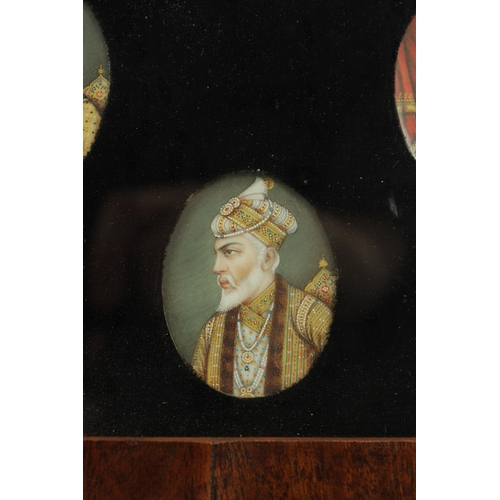 295 - A FRAMED COLLECTION OF 19TH CENTURY INDIAN PORTRAIT MINIATURES ON IVORY, depicting eight mogul emper... 