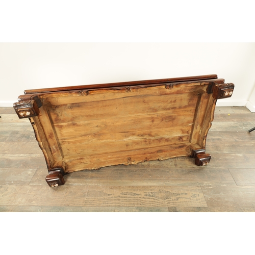 296 - A CHINESE STAINED ELM ALTER TABLE with panelled top above short-shaped scrolled feet (106cm wide 57c... 