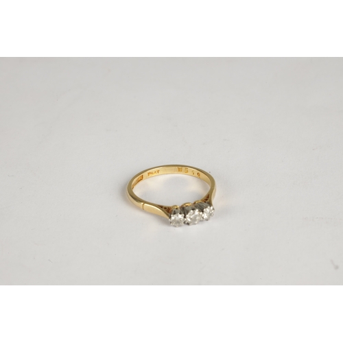 303 - A LADIES 18CT GOLD THREE STONE DIAMOND RING, total weight app. 3g, ring size P.