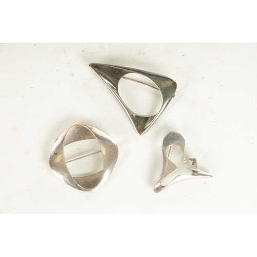 308 - A COLLECTION OF THREE GEORGE JENSEN SILVER BROOCHES of abstract design, total weight app. 45g. (3) (... 