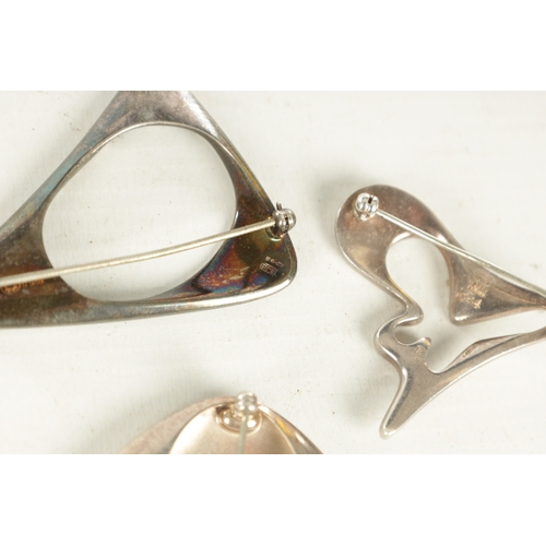 308 - A COLLECTION OF THREE GEORGE JENSEN SILVER BROOCHES of abstract design, total weight app. 45g. (3) (... 