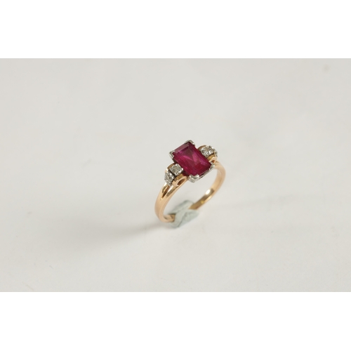 326 - A LADIES 15CT ROSE GOLD RUBY AND DIAMOND RING, having a baguette cut ruby set in a white gold mount ... 