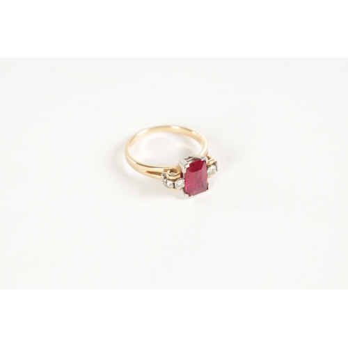 326 - A LADIES 15CT ROSE GOLD RUBY AND DIAMOND RING, having a baguette cut ruby set in a white gold mount ... 