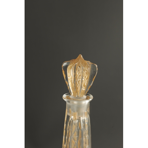 33 - AN R LALIQUE SIX-FIGURINE AMBER STAINED GLASS DECANTER of angled form and decorated with carved pane... 