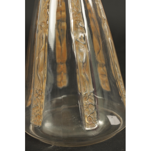 33 - AN R LALIQUE SIX-FIGURINE AMBER STAINED GLASS DECANTER of angled form and decorated with carved pane... 