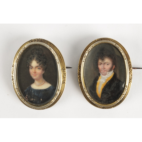 333 - A PAIR OF GEORGE III MINIATURE HAND PAINTED ON IVORY PORTRAITS OF A LADY AND GENTLEMAN in hallmarked... 