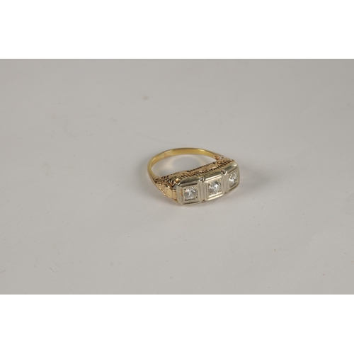 335 - A LADIES 9CT GOLD THREE STONE DIAMOND RING the old cut diamonds set in square white gold frames on p... 