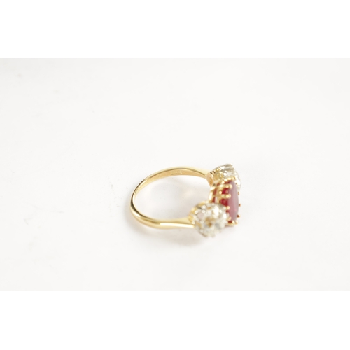 339 - A FINE 18CT YELLOW GOLD RUBY AND TWO-STONE DIAMOND RING straight set with oval centre facet-cut ruby... 