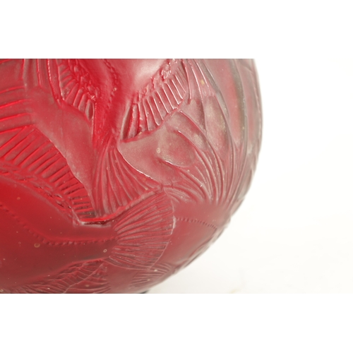 35 - A RENE LALIQUE CASE CHERRY RED AND AMBER GLASS 'POISSONS' GLOBULAR VASE of bulbous form with collare... 